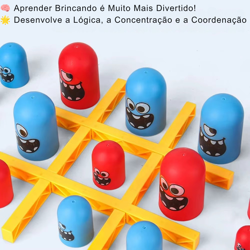 Jogo da velha com pe&ccedil;as coloridas vermelhas e azuis com rostos de monstros sorridentes, em v&aacute;rios tamanhos